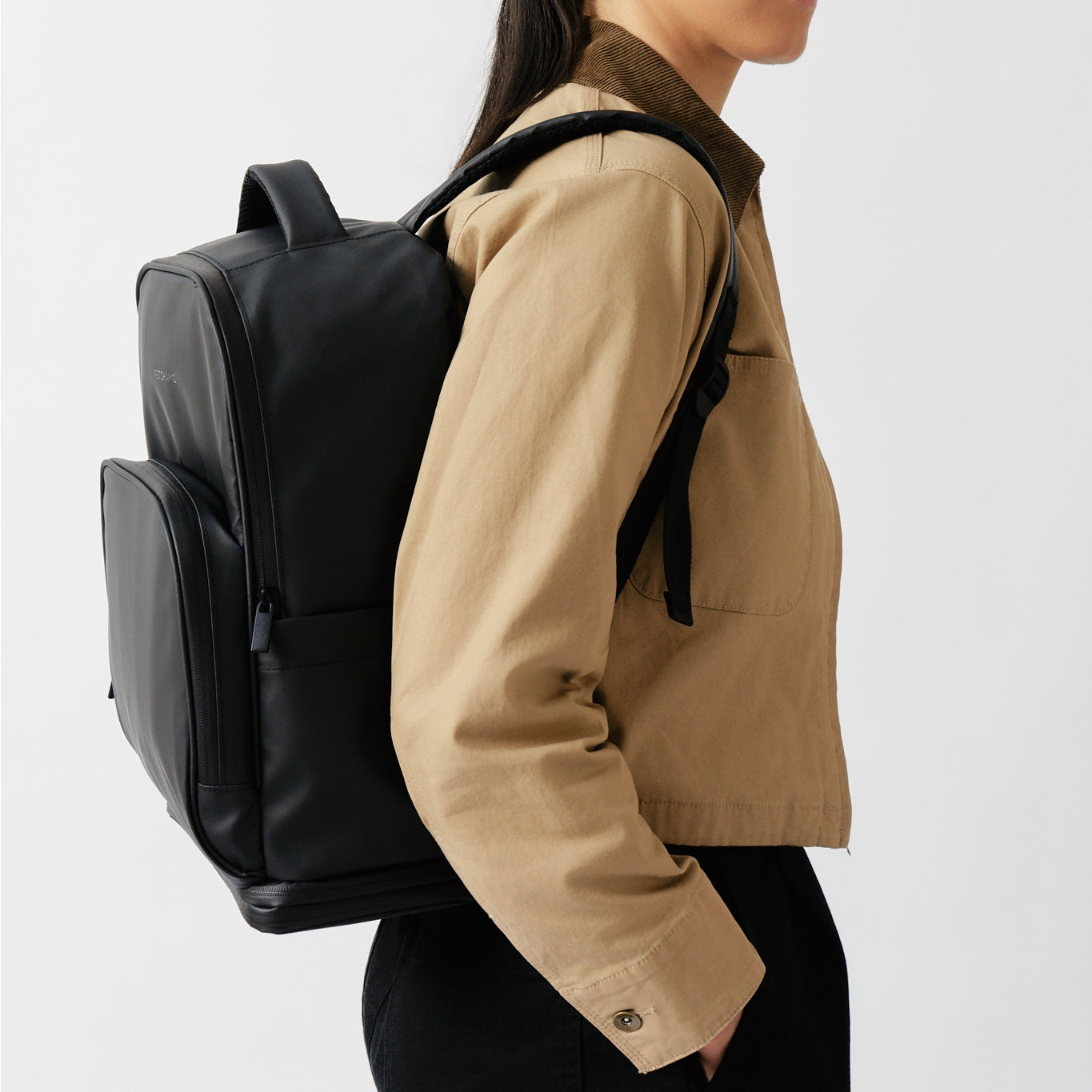 fetchamo Core backpack for dog owners – worn by model, side profile view