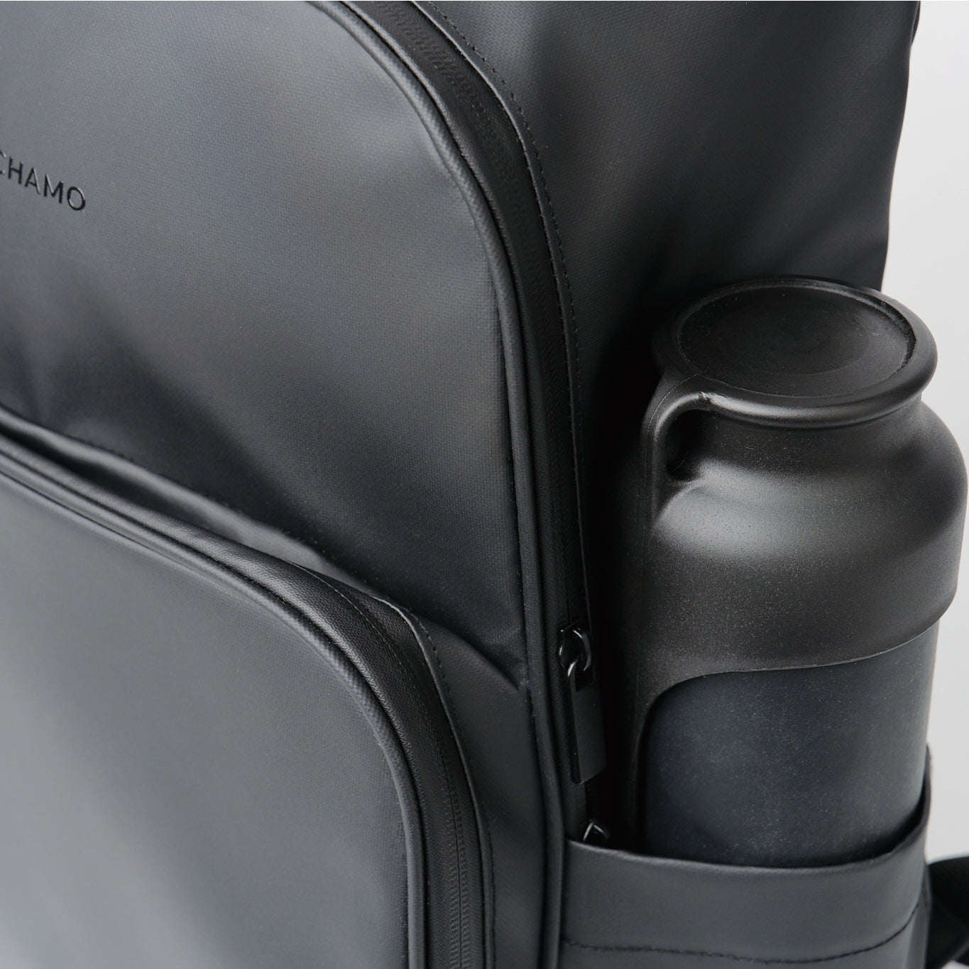 fetchamo Core backpack for dog owners – close-up of material finish and side bottle holder